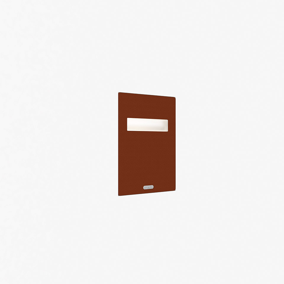 Artemide Nuda wall light: rectangular terracotta panel with a horizontal white diffuser slot and small control button below