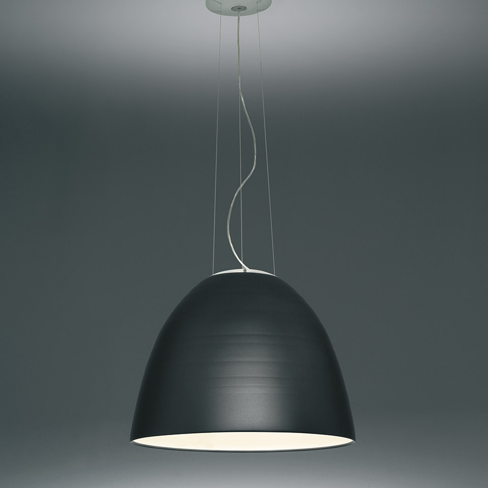 Artemide Nur pendant lamp with dark anthracite dome-shaped shade, white inner diffuser, suspended by thin cables from ceiling
