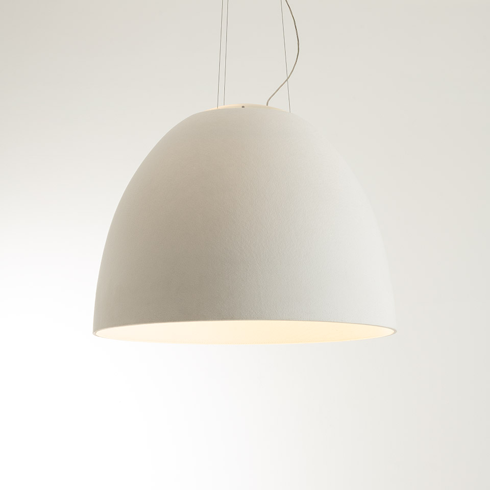 Artemide Nur Acoustic pendant lamp with large white dome-shaped shade in sound-absorbing material, emitting warm downward light