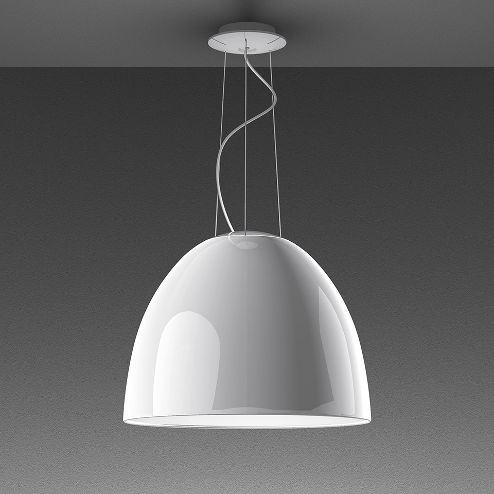 Artemide Nur Gloss pendant lamp with large glossy white dome shade suspended by thin cables from a ceiling canopy
