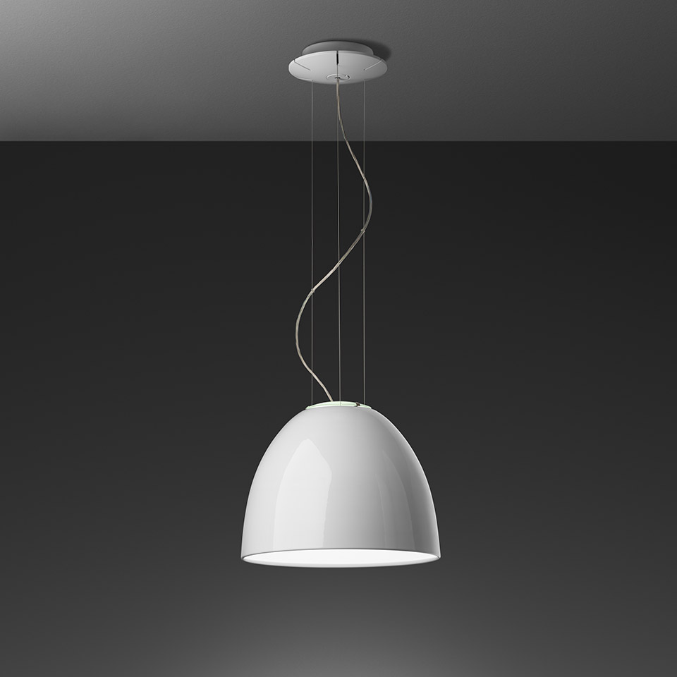 Artemide Nur Mini Gloss pendant lamp with glossy white dome-shaped shade suspended by thin cables from a ceiling canopy
