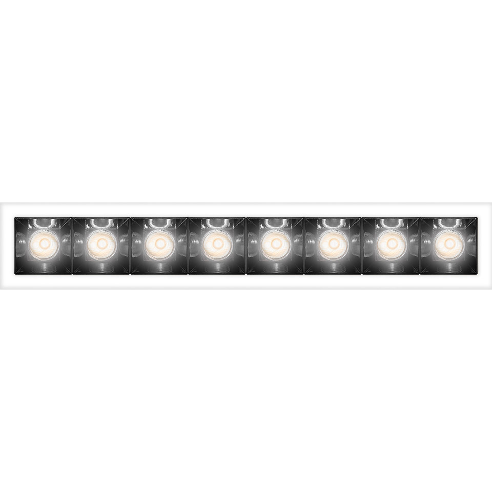 Artemide Sharp recessed linear fixture with 8 adjustable LED spotlights in a white trim, emitting focused warm white light