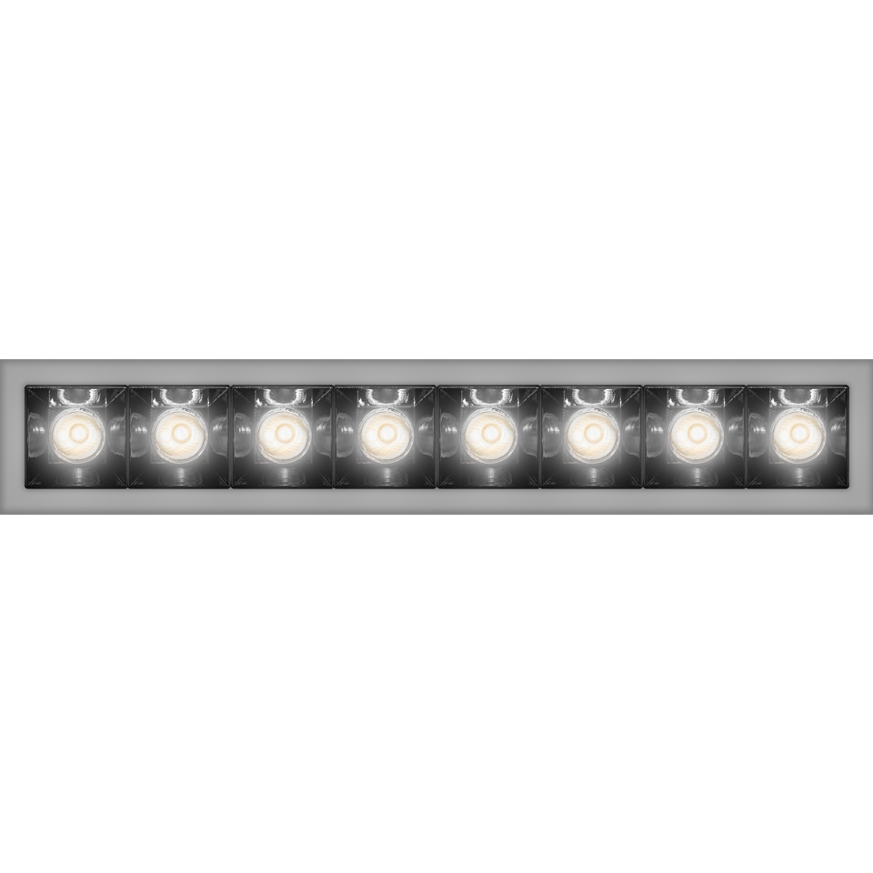 Artemide Sharp Refractive Emission recessed linear fixture with 8 adjustable LED spotlights in a silver frame with black housing