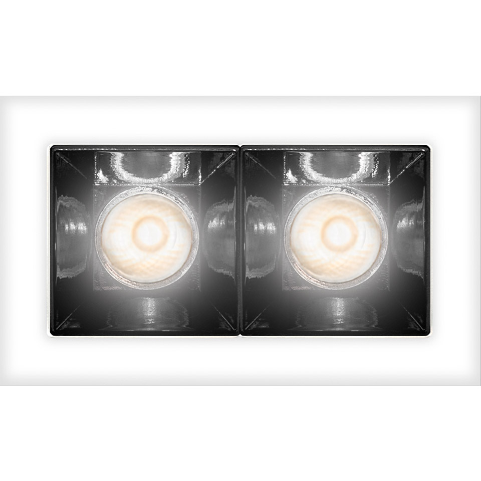 Artemide Sharp recessed ceiling light with two square black reflectors housing warm white LED sources in a white rectangular frame