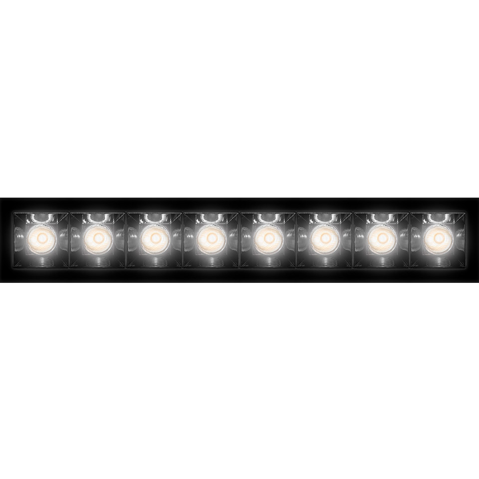 Artemide Sharp Refractive Emission: black rectangular recessed LED bar with eight individual square reflector modules emitting warm white light