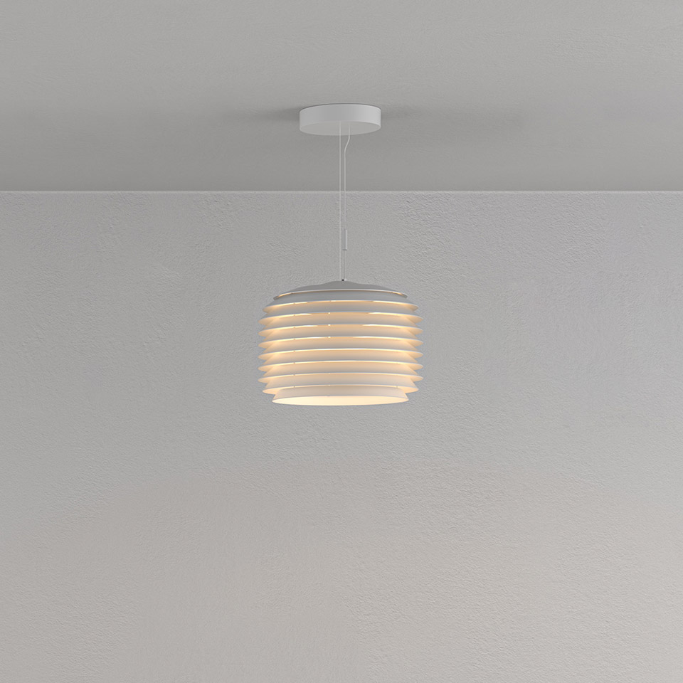 Artemide Slicing pendant lamp in white, featuring layered horizontal rings diffusing warm light, suspended from ceiling by white cord
