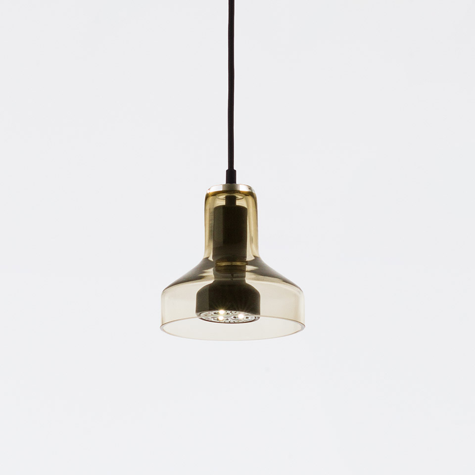 Artemide Stablight pendant lamp with amber-tinted glass shade in two-tier cylindrical form, suspended from a black cord