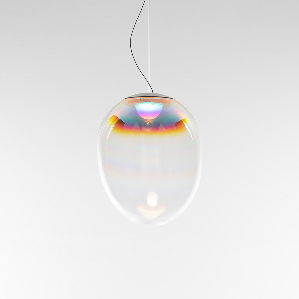 Artemide Stellar Nebula pendant lamp: oval clear glass diffuser with iridescent multicolor interference coating, suspended by black cable