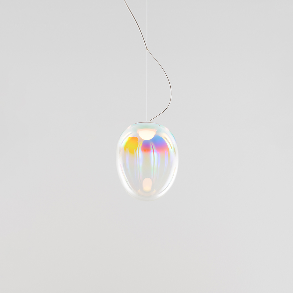 Artemide Stellar Nebula pendant lamp: oval iridescent glass diffuser with rainbow reflections, suspended by a thin wire