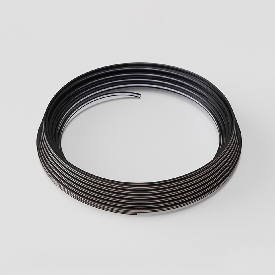Coiled black flat cable roll for Artemide Sylt lighting system, used for flexible installation and power supply