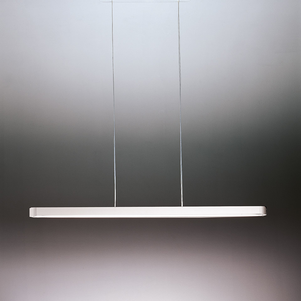 Talo suspension pendant lamp by Artemide: slim rectangular white diffuser suspended by two thin cables, providing uniform linear light