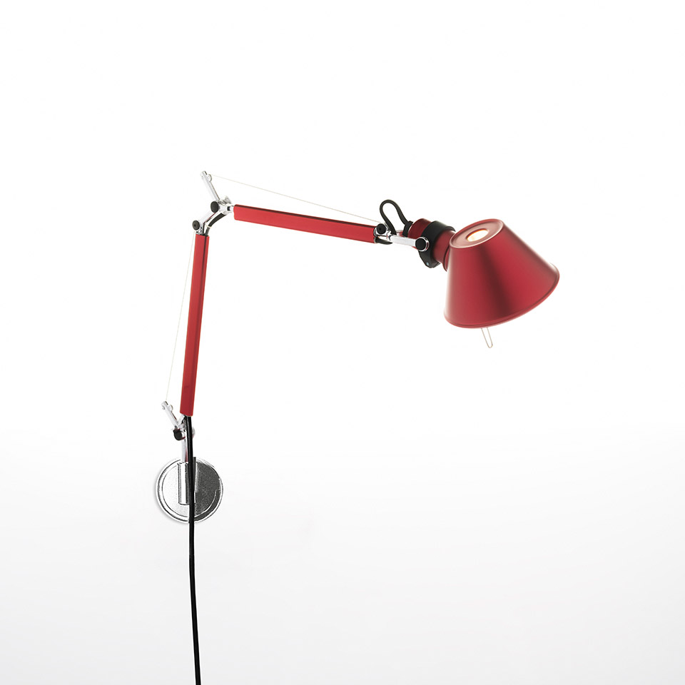 Artemide Tolomeo Micro Parete wall lamp in red, featuring articulated aluminum arms, conical shade, and chrome wall bracket