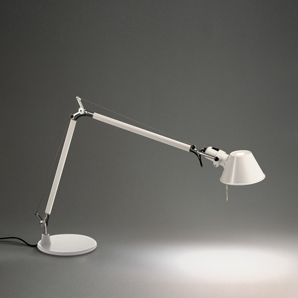 Artemide Tolomeo Mini Tavolo desk lamp in white, featuring adjustable articulated arm with tension cables and conical shade on round base