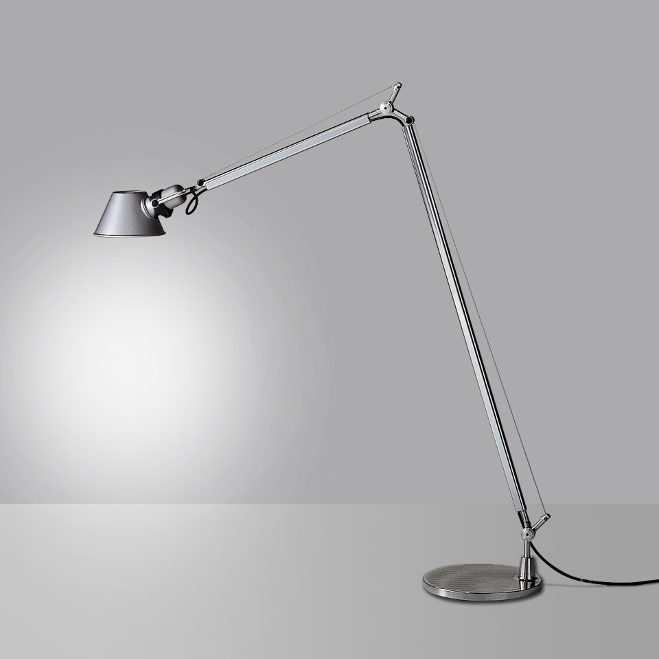 Artemide Tolomeo Terra floor lamp in polished aluminium with adjustable double-arm and conical shade, casting focused light