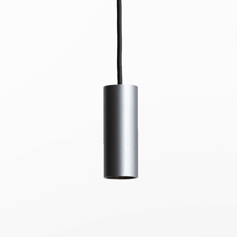 Artemide Turn Around System: minimalist cylindrical pendant lamp in brushed aluminum finish, suspended by a black cable