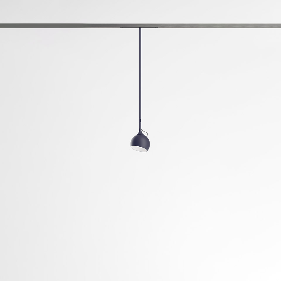 Artemide Turn Around System: dark blue pendant spotlight on track rail, small dome-shaped head hanging from thin cable