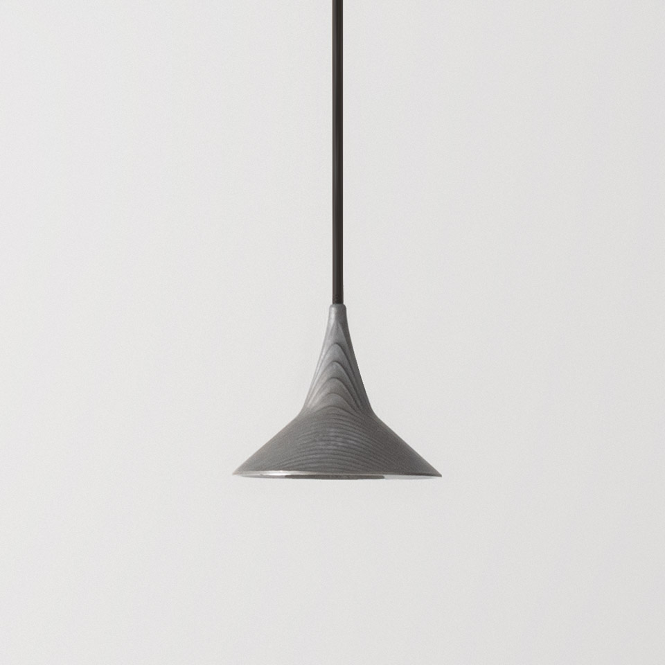 Artemide Unterlinden pendant lamp with grey textured conical shade suspended on a dark cord against white background