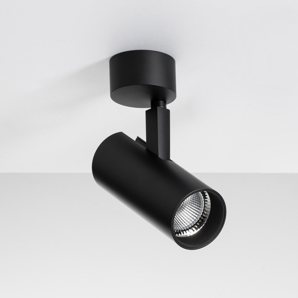 Artemide Vector Ceiling spotlight in matte black, cylindrical head on adjustable arm, ceiling-mounted, with LED light source