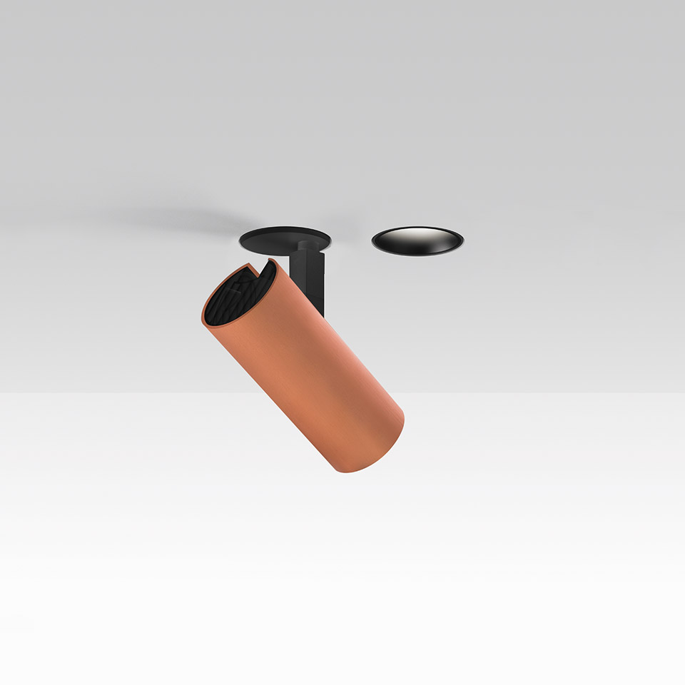 Artemide Vector Recessed spotlight: adjustable terracotta cylindrical head on black recessed mount, shown with separate trim accessory