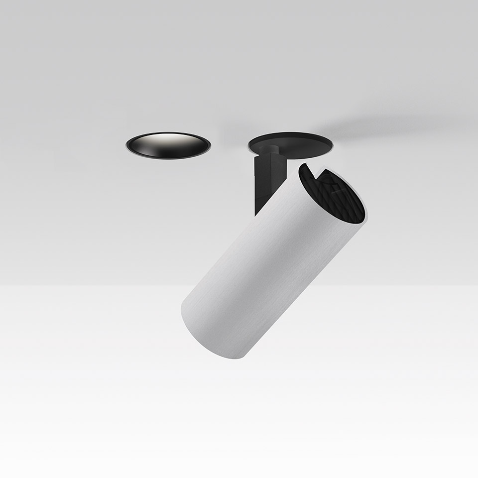 Artemide Vector Recessed spotlight: white cylindrical adjustable fixture emerging from black recessed ceiling mount, tilted at an angle