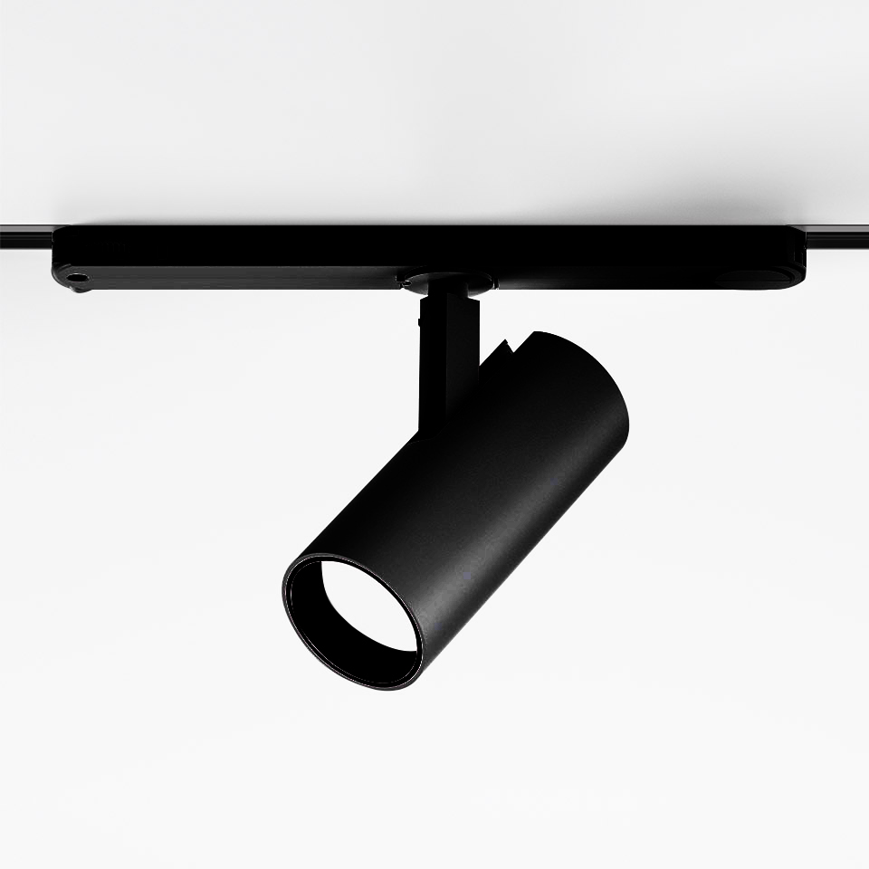 Artemide Vector Track 230V black spotlight on rail, cylindrical body, adjustable tilt, emitting focused white light downward