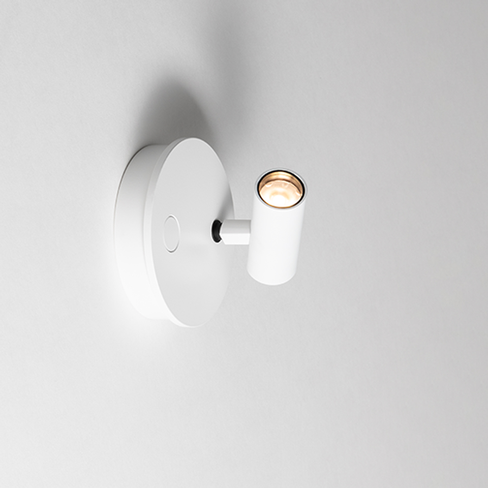 Artemide Vector Wall lamp in white, wall-mounted spotlight with circular base, adjustable cylindrical head and integrated on/off switch