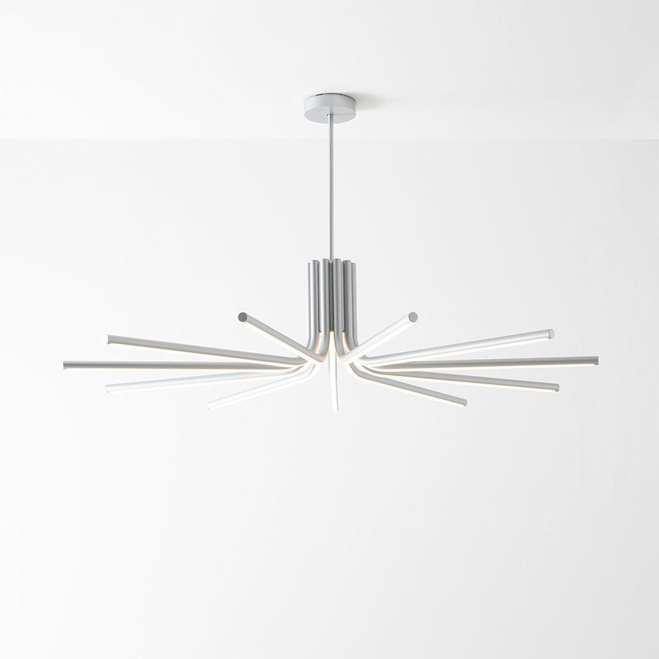 Artemide Veil pendant lamp: starburst design with multiple slim aluminum arms radiating from central hub, emitting soft LED light