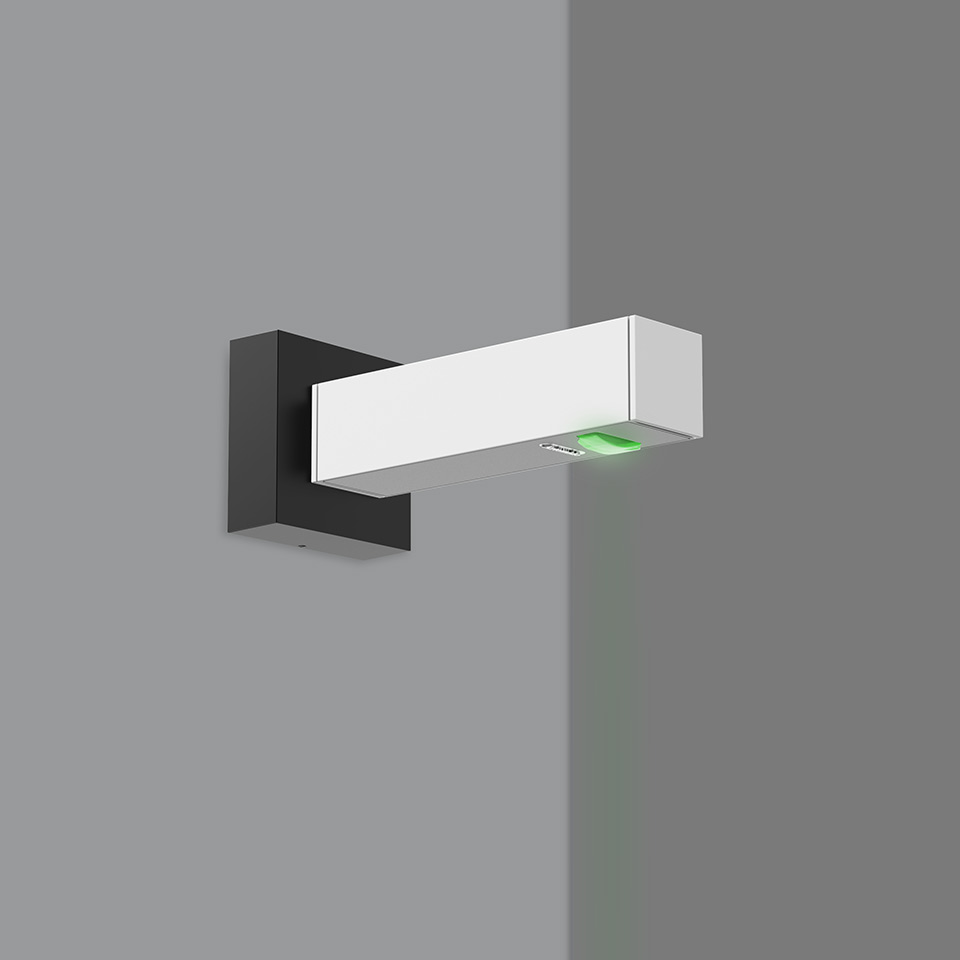 Artemide Walking Parete wall lamp: white rectangular LED body on black bracket, mounted at corner, with green indicator light