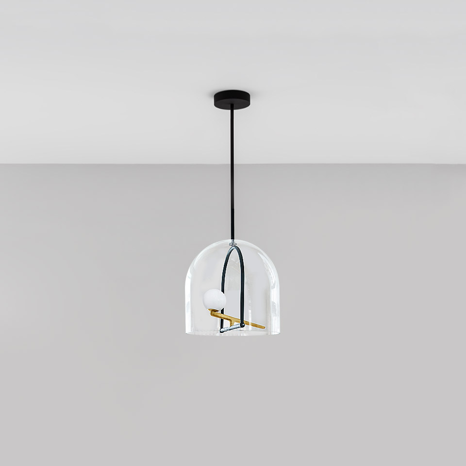 Artemide Yanzi pendant lamp: clear glass dome shade with black arch, gold horizontal bar, and small white opal sphere on black cord