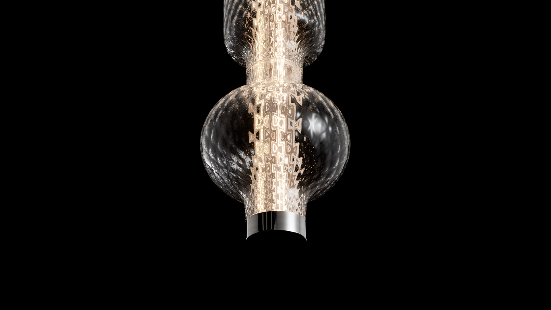Artemide Alambicco floor lamp, tall glass tube with warm glowing light and spherical top, in an elegant classic living room