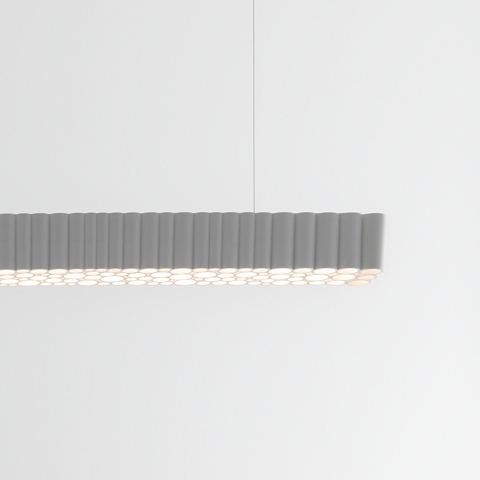 Artemide Calipso Linear Stand Alone pendant lamp: elongated grey horizontal fixture with ribbed diffuser emitting soft uniform LED light