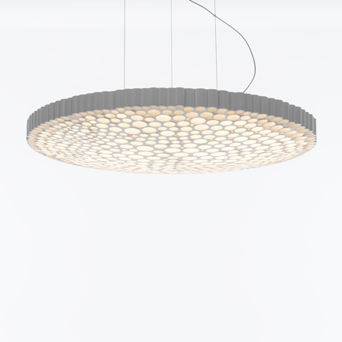 Artemide Calipso pendant lamp: large circular disc with honeycomb LED diffuser pattern, grey ribbed edge, suspended by thin cables