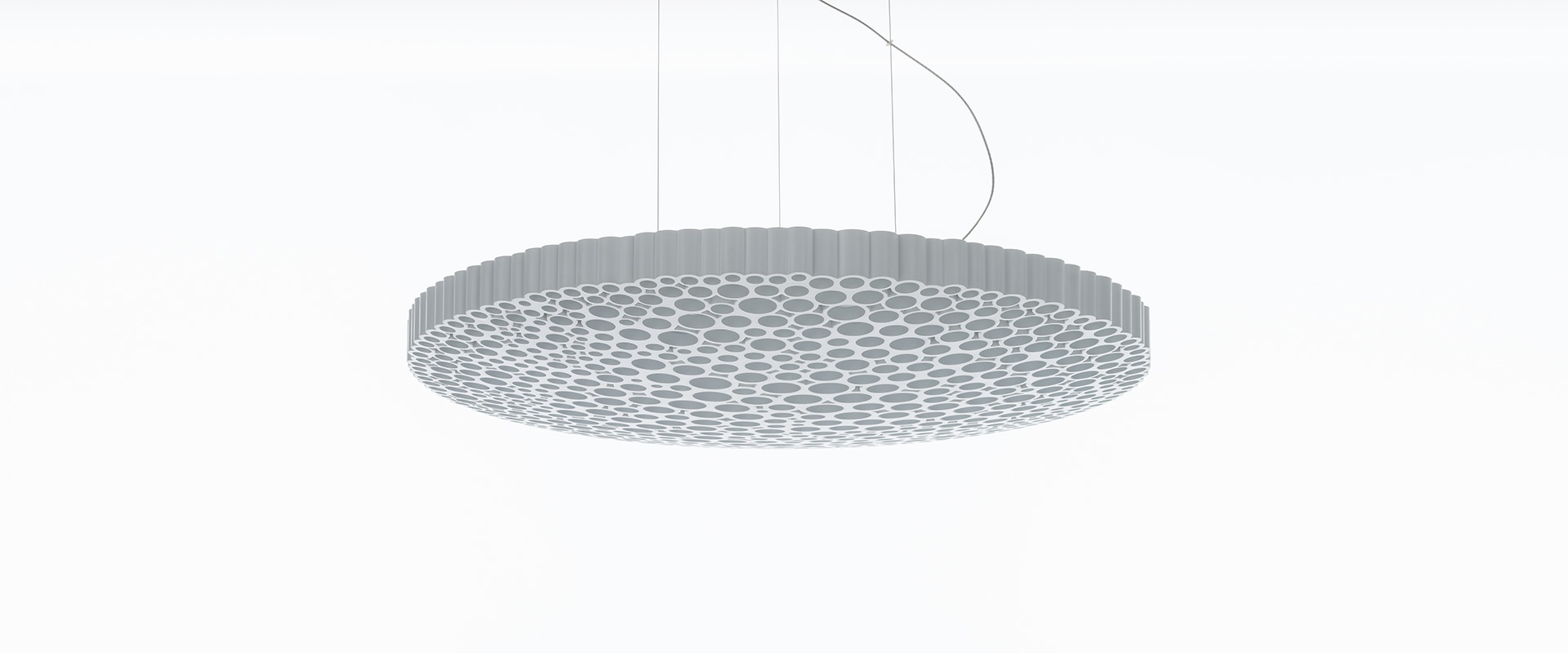 Artemide Calipso pendant lamp: large circular disc with honeycomb pattern surface in white, suspended by thin cables
