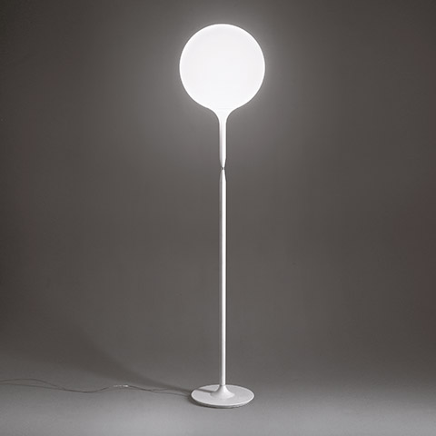 Artemide Castore Terra floor lamp: tall white metal stem on round base, topped with a large opal white spherical glass diffuser