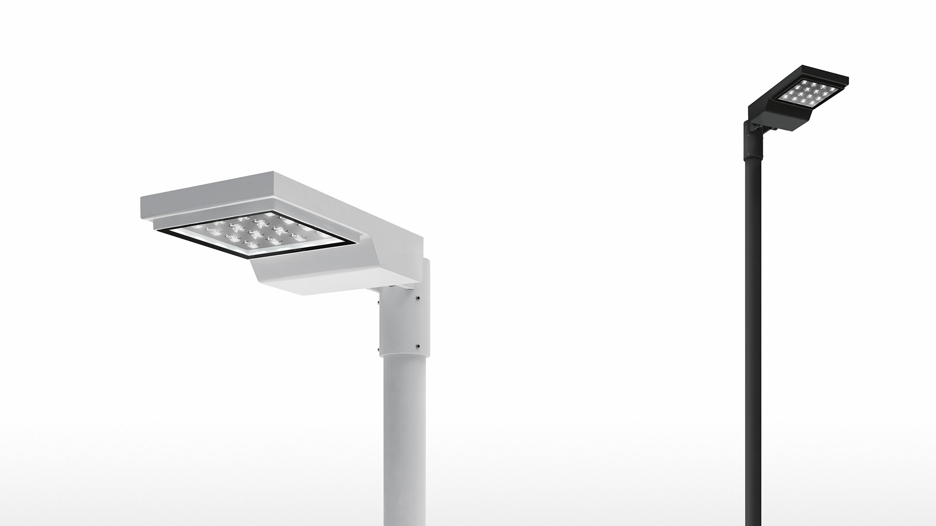Two Artemide Cefiso LED outdoor pole lights: left white version with adjustable arm, right black version on tall straight pole