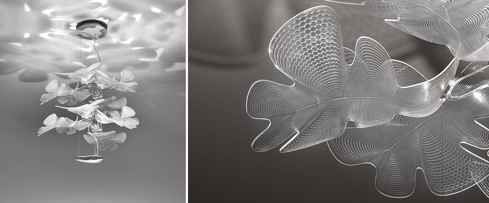 Artemide Chlorophilia 2 pendant lamp: tiered chandelier with translucent white leaf-shaped diffusers arranged like a tree, against red background