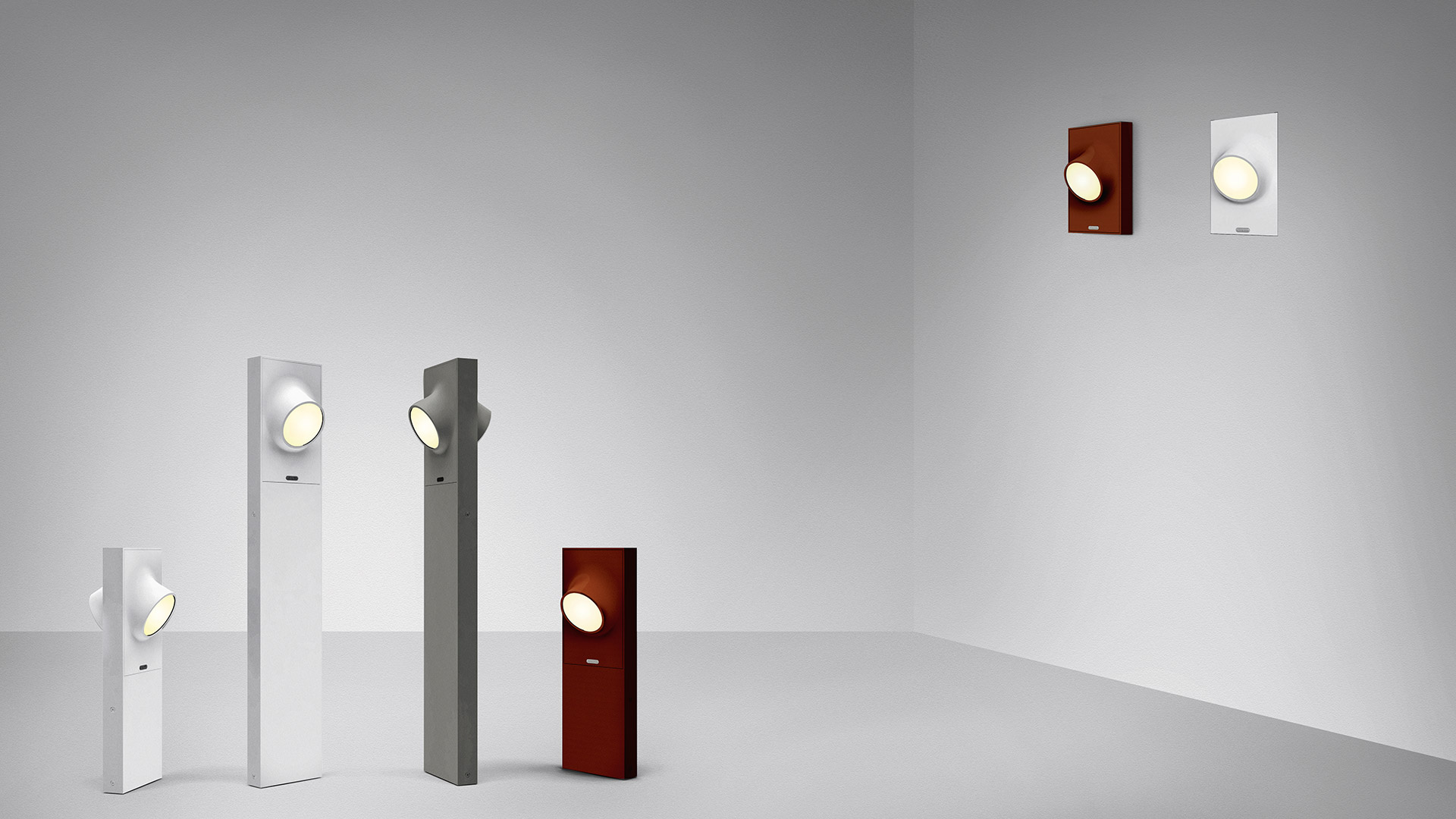 Artemide Ciclope floor and wall lamps in white, grey, and dark red, featuring a circular LED lens, shown in floor-standing and wall-mounted versions.