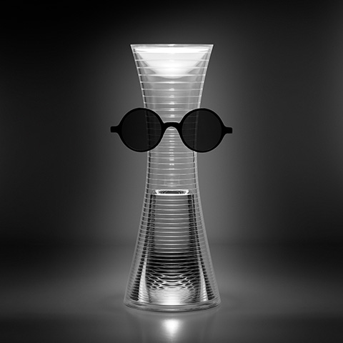 qelvornixuta.onlinee Together portable lamp: hourglass-shaped transparent ribbed body with warm LED light, styled with round black sunglasses