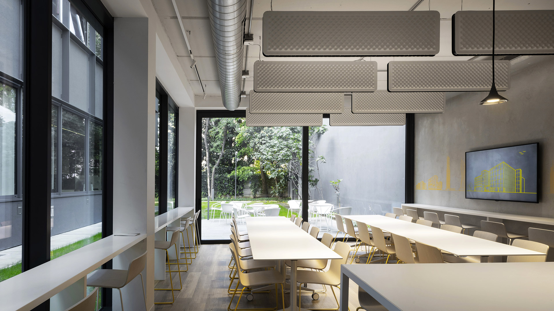 Artemide Eggboard Baffle pendant lamp: dark rectangular acoustic panel with egg-crate texture, emitting warm light along bottom edge