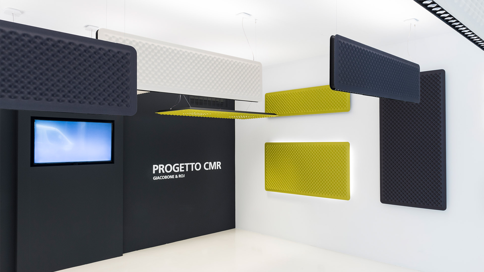 Artemide Eggboard Baffle pendant lamp: tilted rectangular acoustic panel in lime green with egg-crate texture and integrated LED strip