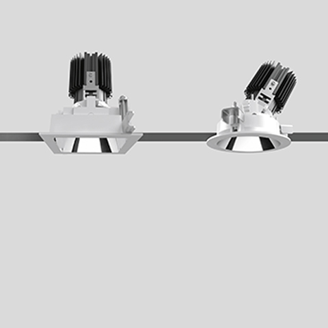 Artemide Everything 105 Trim recessed spotlights: square fixed version left, round adjustable version right, both with black heat sinks