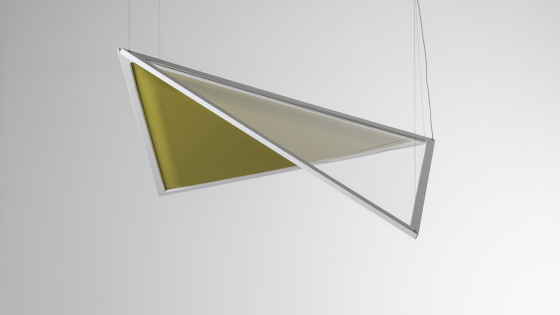 Three Artemide Flexia wall lamps with geometric triangular shades in orange, olive green, and blue-grey, emitting warm light