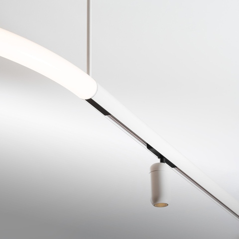 Artemide Gople System: white curved LED pendant arm with integrated track and a cylindrical white spotlight mounted below