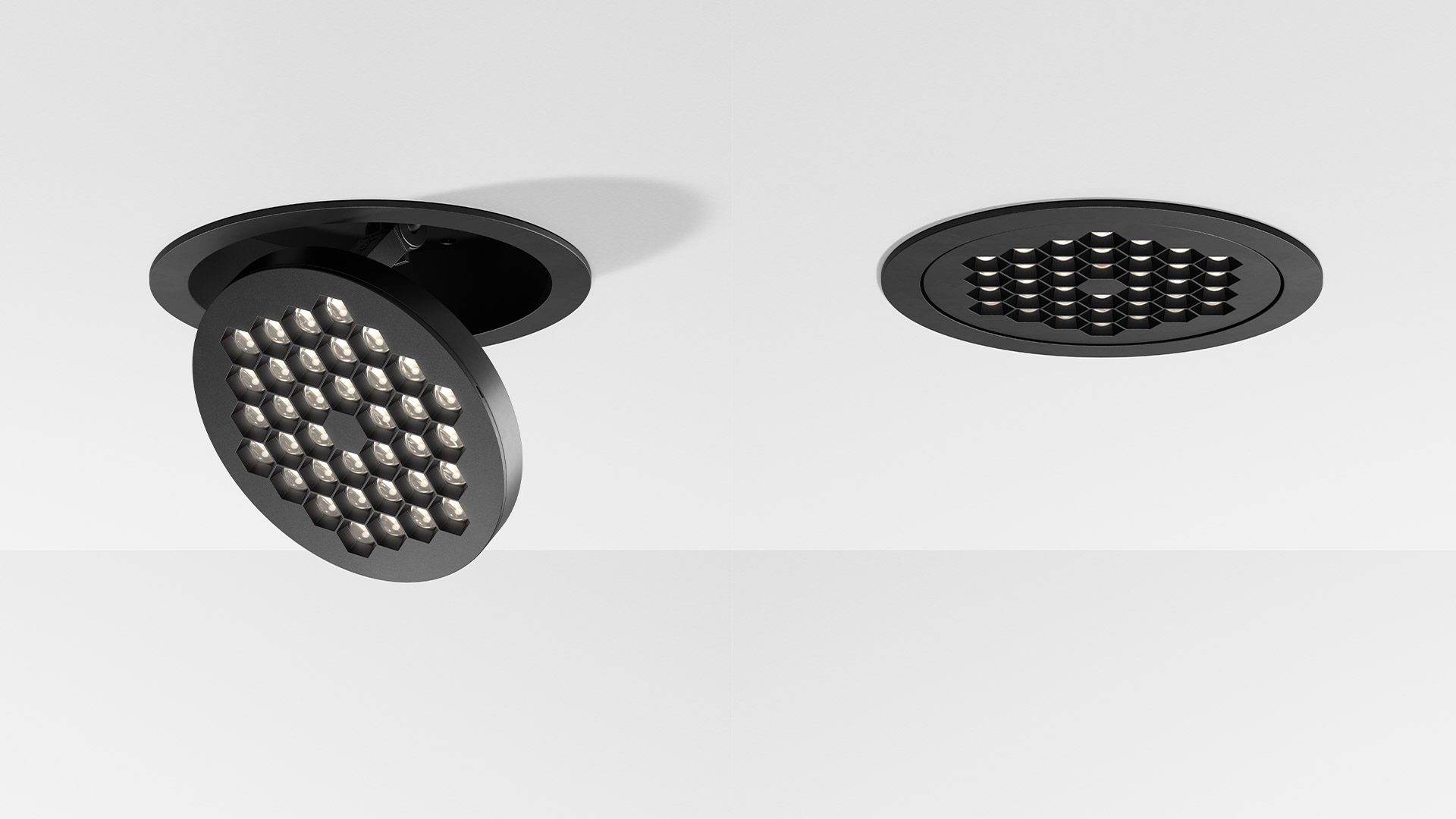 Artemide Helgoland Adjustable recessed ceiling spotlight, white circular trim with tilting LED array of hexagonal lenses