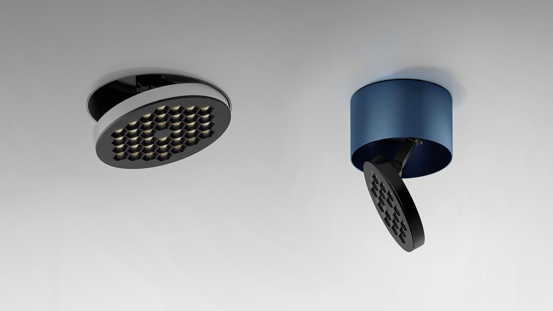 Artemide Helgoland Adjustable recessed spotlight, black circular housing with LED array, tilting mechanism, and red mounting clips