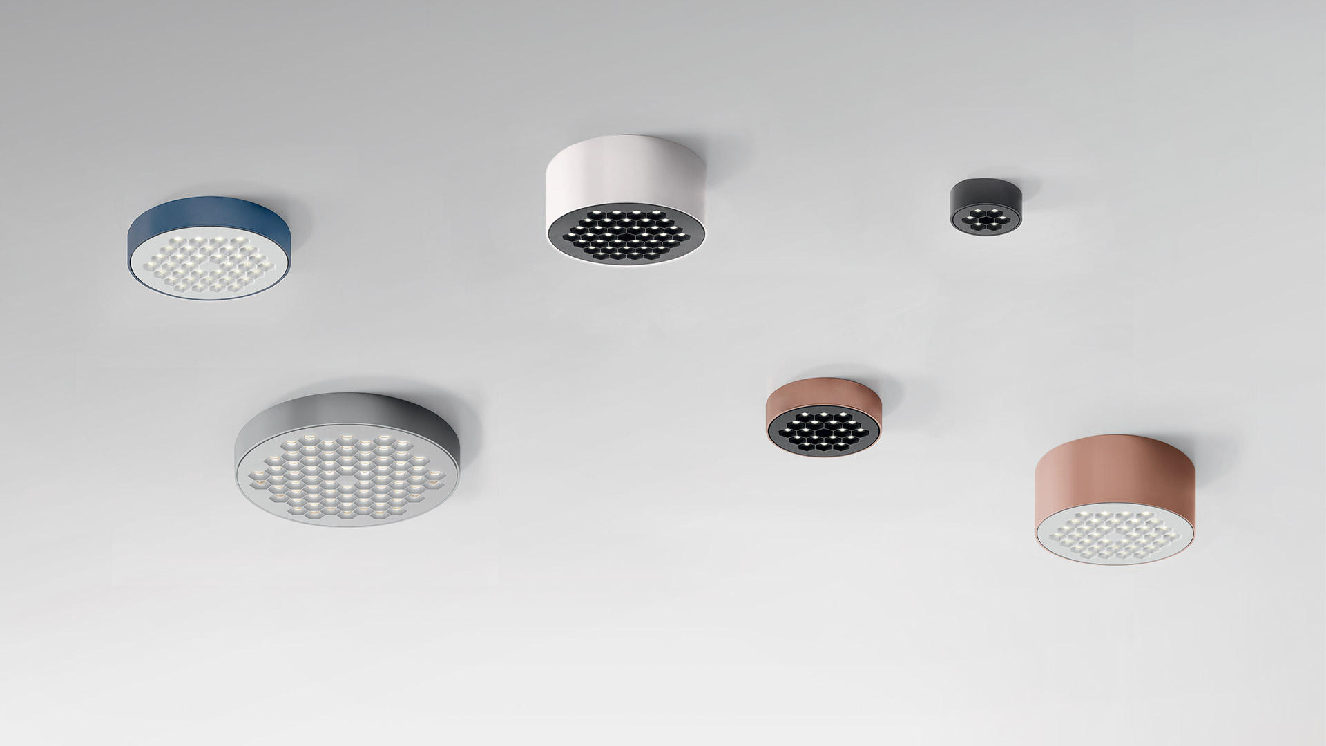 Helgoland recessed ceiling light assembly sequence: four installation stages shown, from flush-mount to surface-mount, in matte black finish