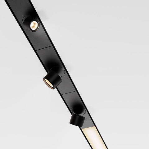 Artemide Hoy System Recessed: black linear track with integrated recessed spotlights and a linear LED diffuser at the tip