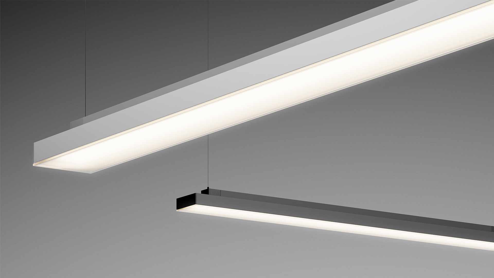 Artemide Hoy Linear Stand Alone pendant lamp: sleek black rectangular profile with warm white diffused LED light, suspended by steel cable