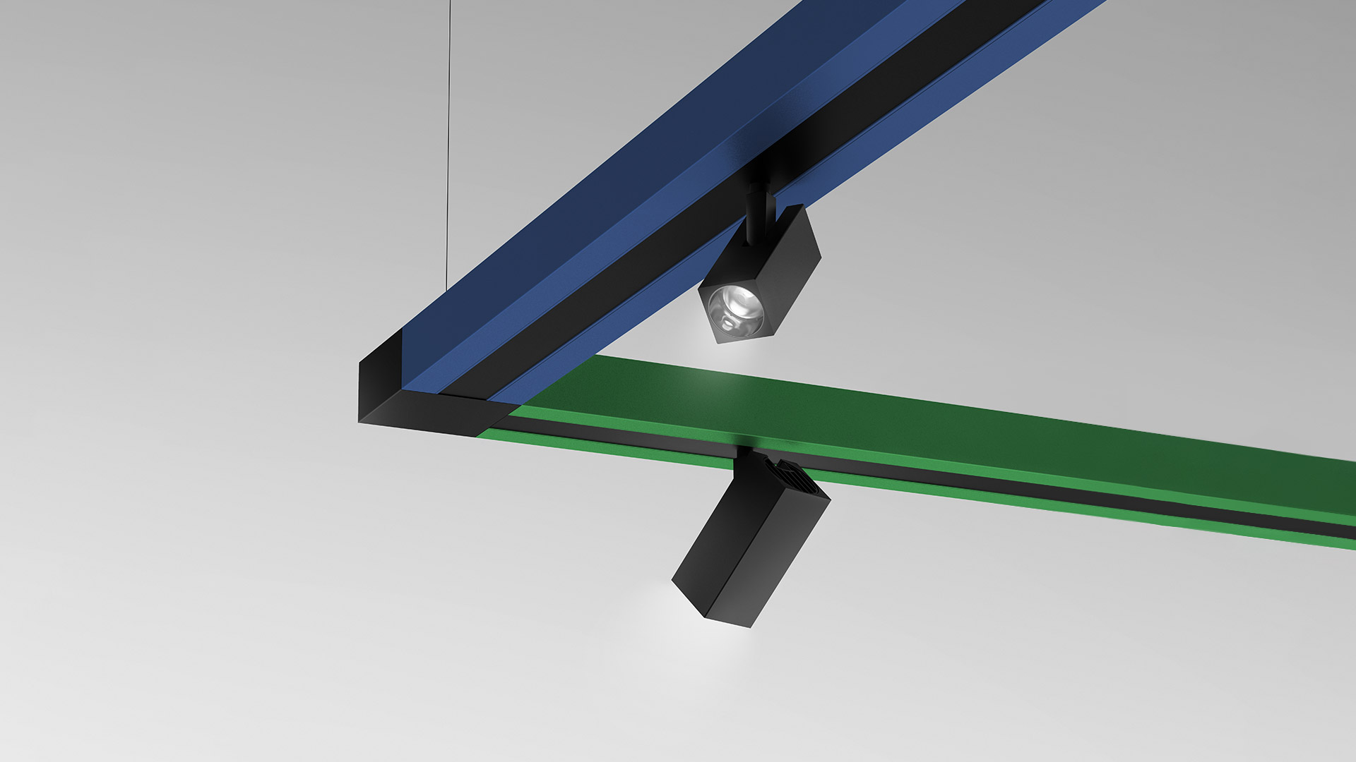Katà Métron pendant light system with angular modular profiles in red, green, blue, yellow, and white suspended from ceiling