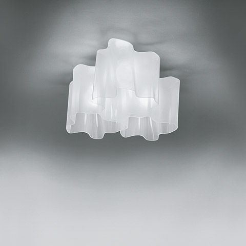 Artemide Logico soffitto 3x120° ceiling lamp with three frosted glass diffusers arranged in an interlocking pattern, emitting soft white light
